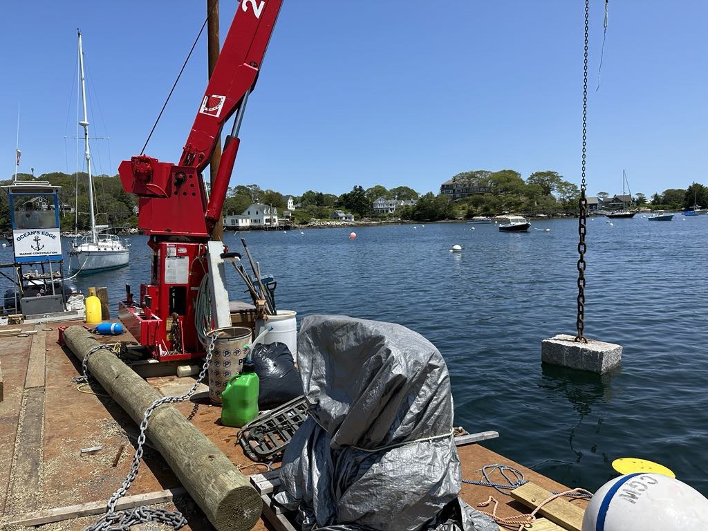 Granite mooring block and chain ready to be set by the Ocean's Edge Marine crew